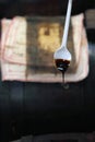 Spoon dripping very old Balsamic Vinegar of Modena