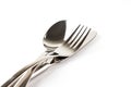 A spoon, fork and knife stacked up on a white background Royalty Free Stock Photo