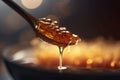 a spoon full of honey dripping from it\'s side