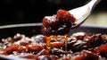 Spoon full of syrup being drizzled over bowl of dates. Perfect for food and dessert-related designs