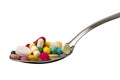 Spoon full of tablets Royalty Free Stock Photo