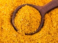 Spoon on ground Dried Marigold Flowers closeup