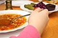 Spoon in hand lunch delicious soup Royalty Free Stock Photo