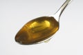 Spoon with honey Royalty Free Stock Photo