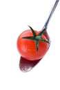 Spoon with little tomato Royalty Free Stock Photo