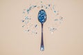Spoon with microplastics Royalty Free Stock Photo