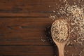Spoon with mixed quinoa seeds and space Royalty Free Stock Photo