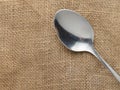 Spoon on a napkin. Top view. Cutlery.