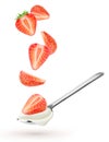 Spoon with natural yogurt and falling pieces of strawberry isolated on white background Royalty Free Stock Photo