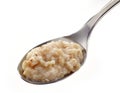 Spoon of oats porridge