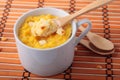 Spoon of polenta baked with cheese Royalty Free Stock Photo