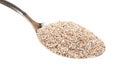 Spoon with portion of rye bran close-up isolated