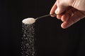 Sugar pouring spoon Royalty Free Stock Photo