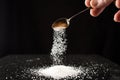 Sugar pouring spoon Royalty Free Stock Photo