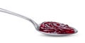 Spoon of red jam isolated on white background Royalty Free Stock Photo