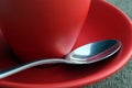Spoon and redcup Royalty Free Stock Photo