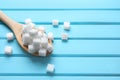 Spoon with refined sugar cubes Royalty Free Stock Photo