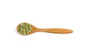 Spoon of sandal wood with lentil isolated on white background