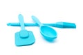 Spoon, spatula, and tassel made of silicone for cooking dishes isolated on white background