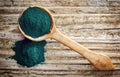 Spoon of spirulina algae powder Royalty Free Stock Photo