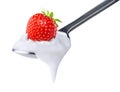 Spoon of strawberry yoghurt