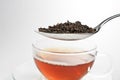 A spoon with tealeafs Royalty Free Stock Photo