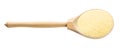 Spoon with uncooked durum wheat semolina isolated