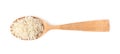 Spoon with uncooked long grain rice on white background