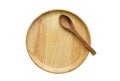Spoon on wood plate, top view Royalty Free Stock Photo