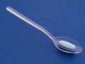 Spoonful of medicine, blue pill. Royalty Free Stock Photo
