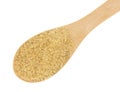Spoonful of turbinado sugar on a white background Royalty Free Stock Photo
