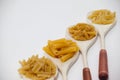 Spoons filled with varieties of pasta Royalty Free Stock Photo