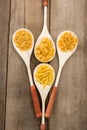 Spoons filled with varieties of pasta Royalty Free Stock Photo