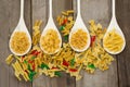 Spoons filled with varieties of pasta Royalty Free Stock Photo