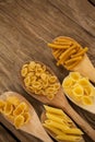 Spoons filled with varieties of pasta Royalty Free Stock Photo