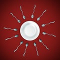 Spoons straggling to get to a plate Royalty Free Stock Photo