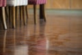 A spoor on muddy dust wooden living room floor in the house