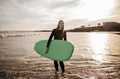 Sport Activities. Portrait Of Cheerful Young Surfer Woman Posing With Surfboard Royalty Free Stock Photo