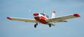 Sport airplane soaring in sky