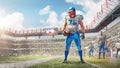 Sport. An American football player stands in stadium and holds a ball in his hand. Daytime stadium full of fans