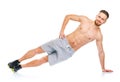 Sport attractive man doing fitness exercises on the white