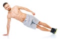 Sport attractive man doing fitness exercises on the white