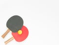 Sport background. Red and black ping-pong rackets and balls. Flat lay, top view. Royalty Free Stock Photo