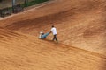 Sport base staff preparing the outdoor tennis fields