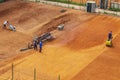 Sport base staff preparing the outdoor tennis fields