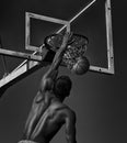 Sport. Basketball player in action -- black and white toned photo