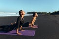 Sport On Beach. Stretching Couple In Fashion Sportswear Workout. Handsome Man And Sexy Woman Training On Yoga Mat. Royalty Free Stock Photo