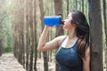 Sport beautiful young woman girl lifestyle exercise healthy drinking water after running workout Royalty Free Stock Photo