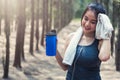 Sport beautiful young woman girl lifestyle exercise healthy drinking water after running workout Royalty Free Stock Photo