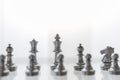 Sport board game, Business and planning concept. Closeup of King, Queen, Bishop, knight and pawn silver chess pieces on glass